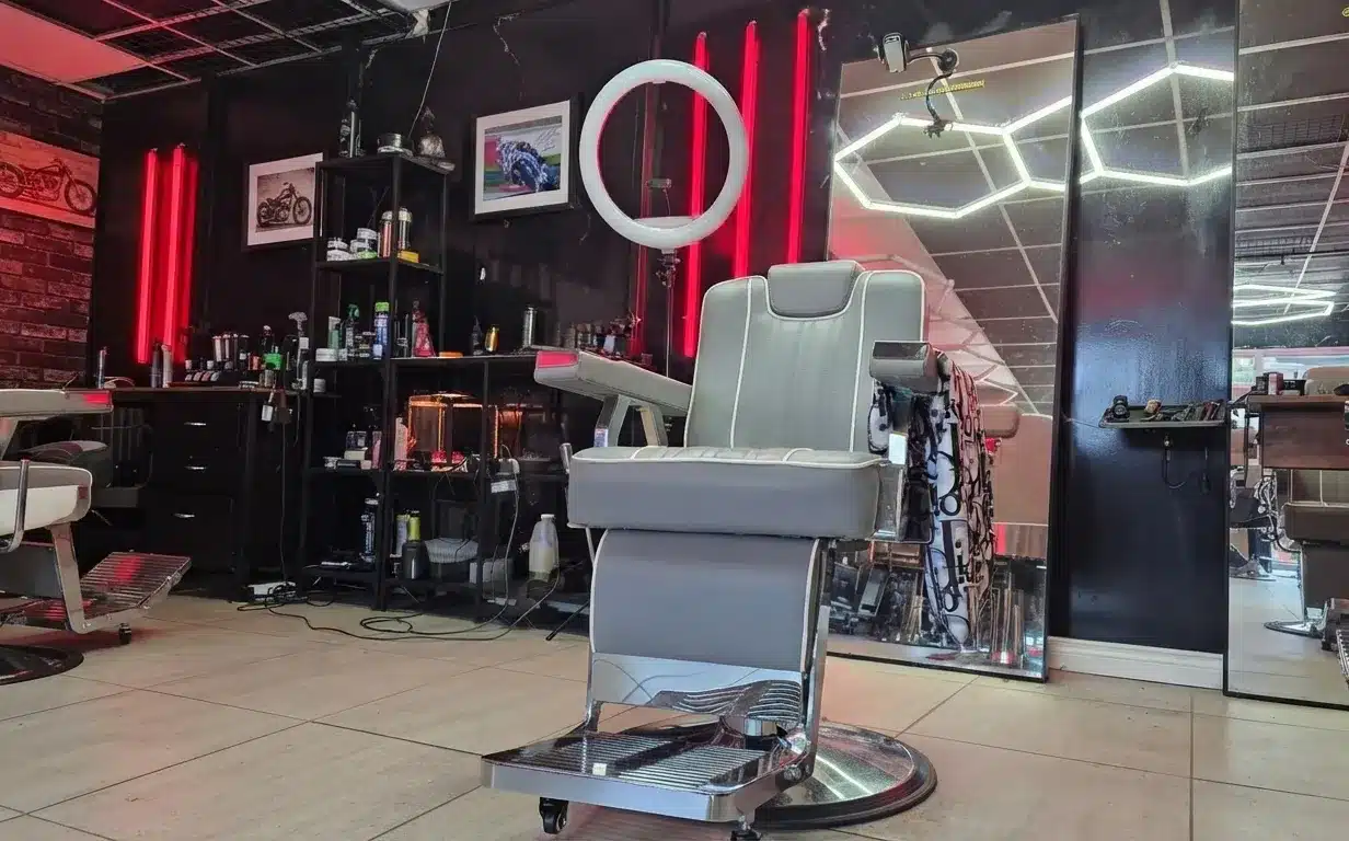 Barber styling a client’s hair