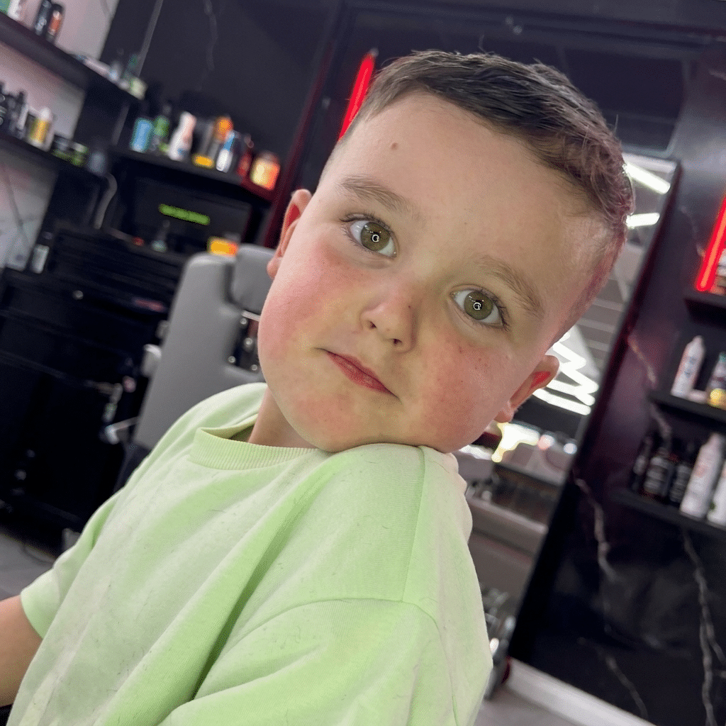 Boy after his sensory-friendly haircut